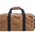 Waxed canvas duffel bag with webbing straps, padded handle and brass zipper