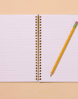 Dreams do come true, especially when they involve pickles. This snack-inspired spiral notebook features quirky illustrated pickles on a letterpress printed cover and 48 lined pages inside. It's the perfect size to carry your notes, lists, ideas, or secret snack plans. 