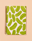 Dreams do come true, especially when they involve pickles. This snack-inspired spiral notebook features quirky illustrated pickles on a letterpress printed cover and 48 lined pages inside. It's the perfect size to carry your notes, lists, ideas, or secret snack plans. 