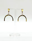This Adaptive Add-On converts your Son of a Sailor earrings into easy-to-wear clip-ons. It's perfect for those without pierced ears, those with sensitive or stretched earlobes, or anyone who finds traditional earwires challenging. Available in sterling silver or 14k gold-filled, it offers a comfortable, accessible fit without sacrificing style.
