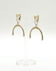 This Adaptive Add-On converts your Son of a Sailor earrings into easy-to-wear clip-ons. It's perfect for those without pierced ears, those with sensitive or stretched earlobes, or anyone who finds traditional earwires challenging. Available in sterling silver or 14k gold-filled, it offers a comfortable, accessible fit without sacrificing style.