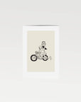 Celebrate adventure, freedom, and a love of the open road with this unframed art print. Featuring a motorcycle, a six-pack, and a sketchy, hand-drawn style, this minimal retro piece brings effortless cool and whimsy to any space. Perfect as motorcycle-themed decor or vintage-inspired wall art, it adds a fun, free-spirited touch to your home.