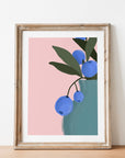 Bring color to your walls with this vibrant blueberry bouquet print! A bold pink background and modern style add cheerful energy to any space.
