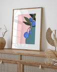 Bring color to your walls with this vibrant blueberry bouquet print! A bold pink background and modern style add cheerful energy to any space.