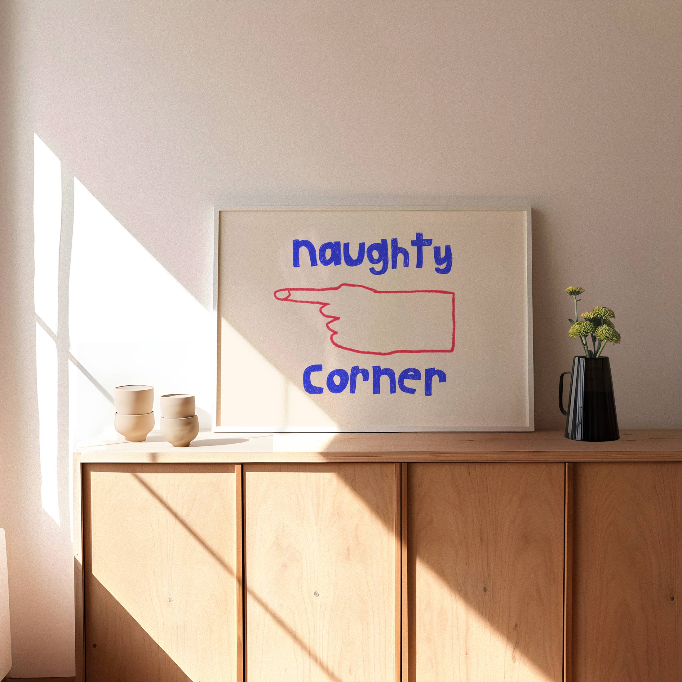 Add cheeky charm with this bold red & blue Naughty Corner print. Clean white background, playful hand-drawn lettering, and a pointing hand bring the fun.