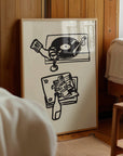 This piece of art celebrates the perfect night in. This unframed art print is a charming illustration of the ultimate combination: wine and vinyl. With its scribbley line texture, it has a wonderfully relaxed feel and modern aesthetic that’s a perfect addition to a living room, bar cart, or cozy reading nook. Perfect for wine lovers and foodies.