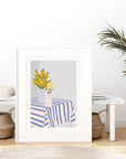 Cheerful yellow flowers in striped vases add modern charm to your space! This bold, colorful print brings a bright, happy vibe to any room
