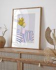 Cheerful yellow flowers in striped vases add modern charm to your space! This bold, colorful print brings a bright, happy vibe to any room