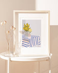 Cheerful yellow flowers in striped vases add modern charm to your space! This bold, colorful print brings a bright, happy vibe to any room
