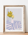 Cheerful yellow flowers in striped vases add modern charm to your space! This bold, colorful print brings a bright, happy vibe to any room