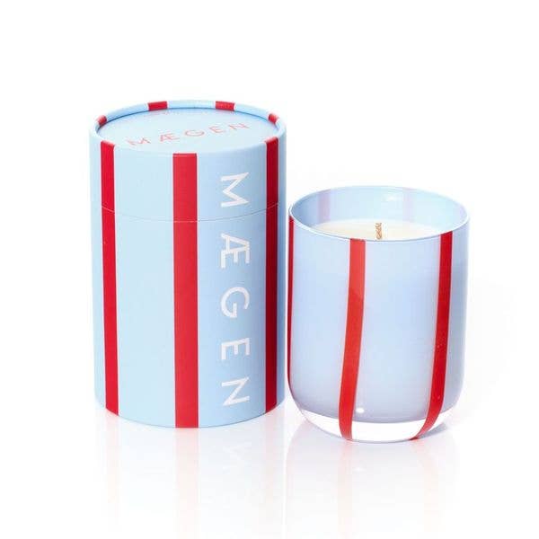 Colorful glass candle with tomato & mint leaf scent. Made with clean-burning soy wax. Reuse the striped vessel as bold, playful glassware.