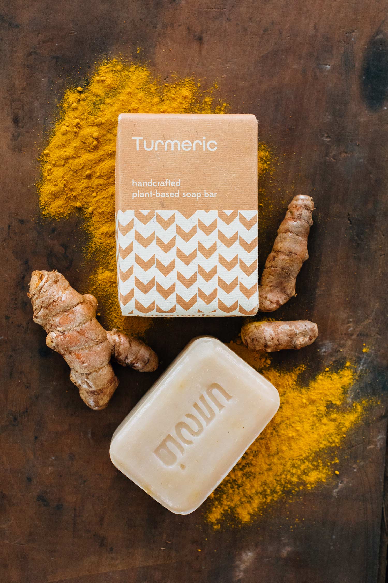 Calm your skin and your mind as you wrap yourself in the mild ginger and woodsy scent of this turmeric soap! A natural anti-inflammatory and antioxidant with antibacterial properties, turmeric soothes irritated skin and helps create a more even complexion. The perfect addition to your skincare routine both morning and night! Handcrafted in India by the master soap makers of Palam Rural where one bar of soap sends one child to school for one day.