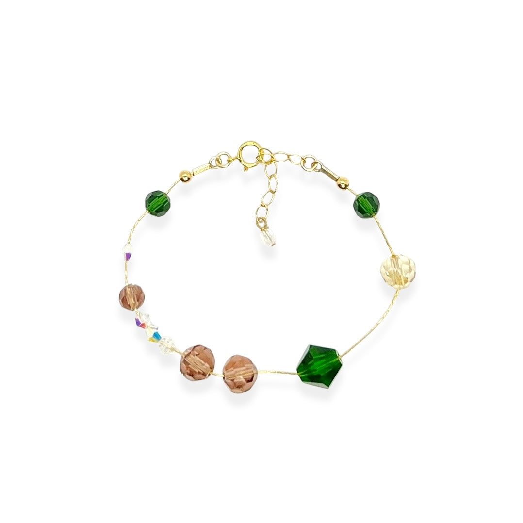 The Beaded Crystal Bracelet is a vibrant celebration of connection and joy, designed to brighten your day and remind you of the bonds that matter most. Crafted with 14k gold-filled components and vibrant, high-quality crystals, it adds a cheerful pop of color to your wrist. The unique adjustable design lets you either let the beads move freely along the bracelet or cinch them together for a perfectly centered look.