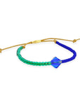 Grounded in natural beauty with a flash of brilliance, the Leather Bracelet brings texture and color together in one thoughtful design. Japanese glass beads are handwoven onto a supple leather band, accented with a singular hand-cut crystal and finished with a 14k gold-filled sliding clasp.