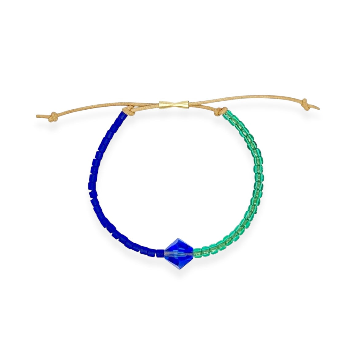 Grounded in natural beauty with a flash of brilliance, the Leather Bracelet brings texture and color together in one thoughtful design. Japanese glass beads are handwoven onto a supple leather band, accented with a singular hand-cut crystal and finished with a 14k gold-filled sliding clasp.