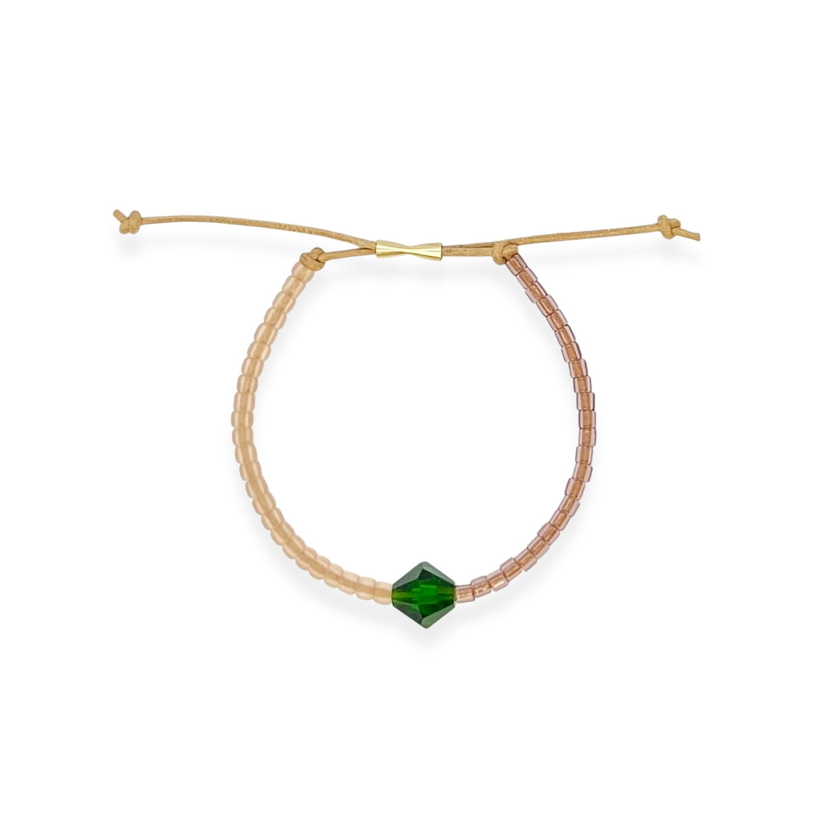 Grounded in natural beauty with a flash of brilliance, the Leather Bracelet brings texture and color together in one thoughtful design. Japanese glass beads are handwoven onto a supple leather band, accented with a singular hand-cut crystal and finished with a 14k gold-filled sliding clasp.
