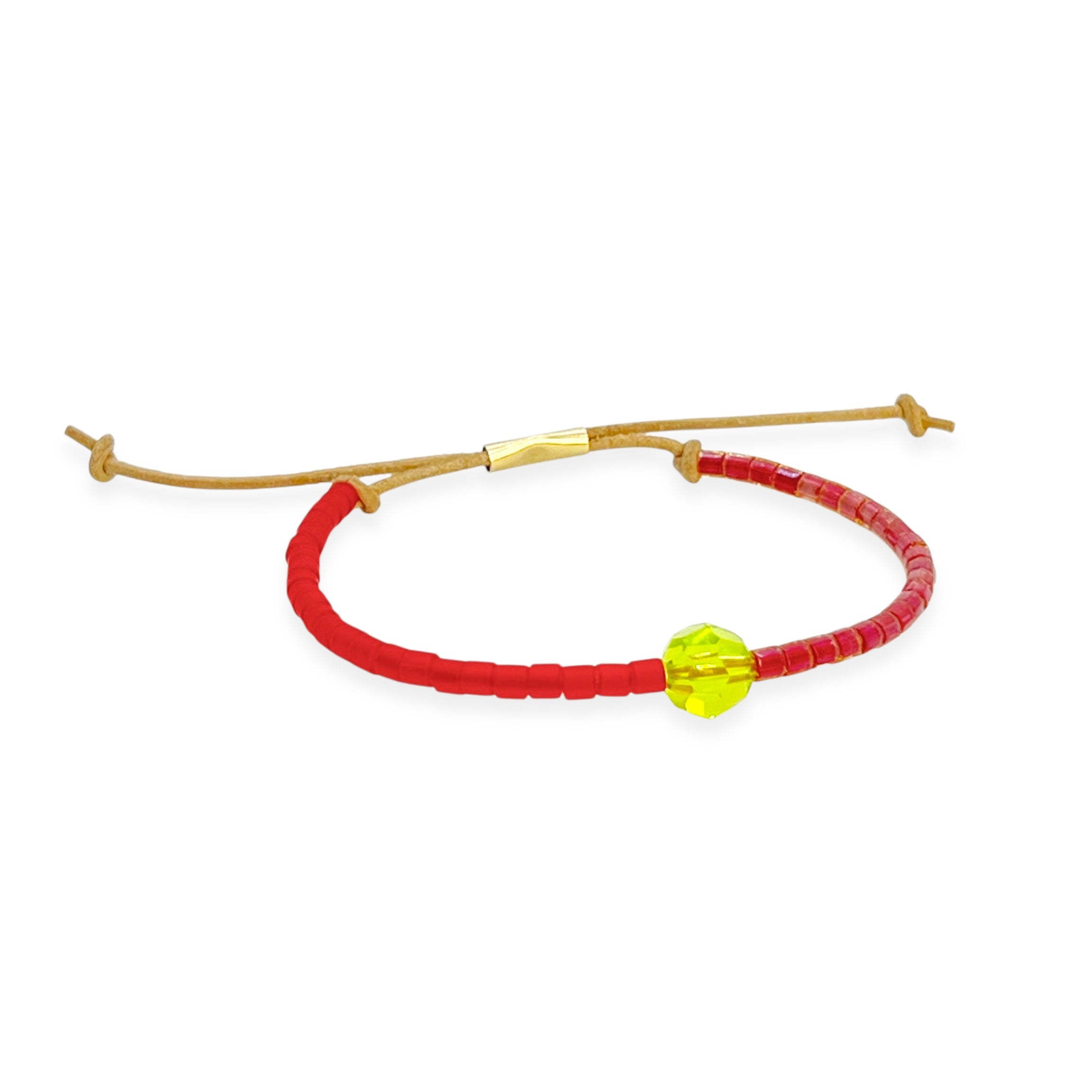 Grounded in natural beauty with a flash of brilliance, the Leather Bracelet brings texture and color together in one thoughtful design. Japanese glass beads are handwoven onto a supple leather band, accented with a singular hand-cut crystal and finished with a 14k gold-filled sliding clasp.