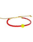 Grounded in natural beauty with a flash of brilliance, the Leather Bracelet brings texture and color together in one thoughtful design. Japanese glass beads are handwoven onto a supple leather band, accented with a singular hand-cut crystal and finished with a 14k gold-filled sliding clasp.
