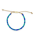 Part of our nostalgic friendship bracelet collection, this version features beautifully crafted Japanese glass beads strung on durable, comfortable cord and finished with a 14k gold-filled sliding clasp. It offers the same unisexy, elevated take on throwback style, perfect for stacking or wearing solo.