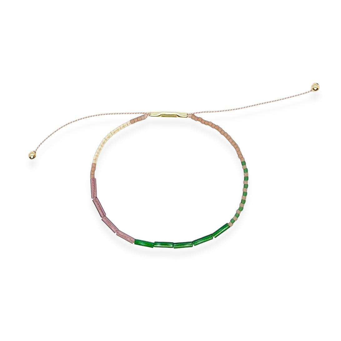 Soft, colorful, and effortlessly cool, the Beaded Silk Bracelet is made for everyday wear with a touch of sparkle. An adjustable silk cord is paired with glass beads and a 14k gold-filled clasp to create a piece that fits like a charm. Stack a few or wear one proudly in your favorite color.
