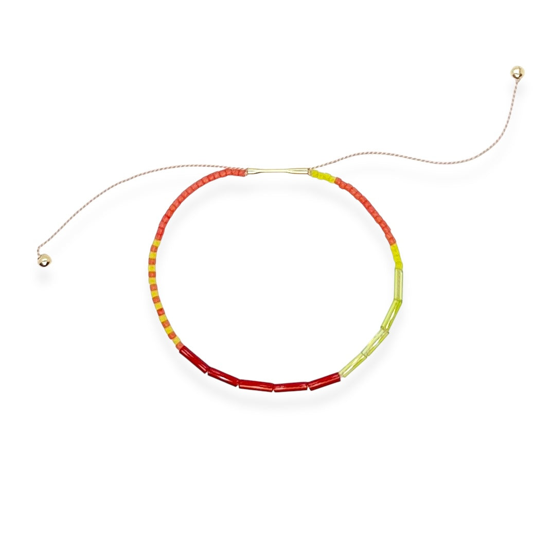 Soft, colorful, and effortlessly cool, the Beaded Silk Bracelet is made for everyday wear with a touch of sparkle. An adjustable silk cord is paired with glass beads and a 14k gold-filled clasp to create a piece that fits like a charm. Stack a few or wear one proudly in your favorite color.