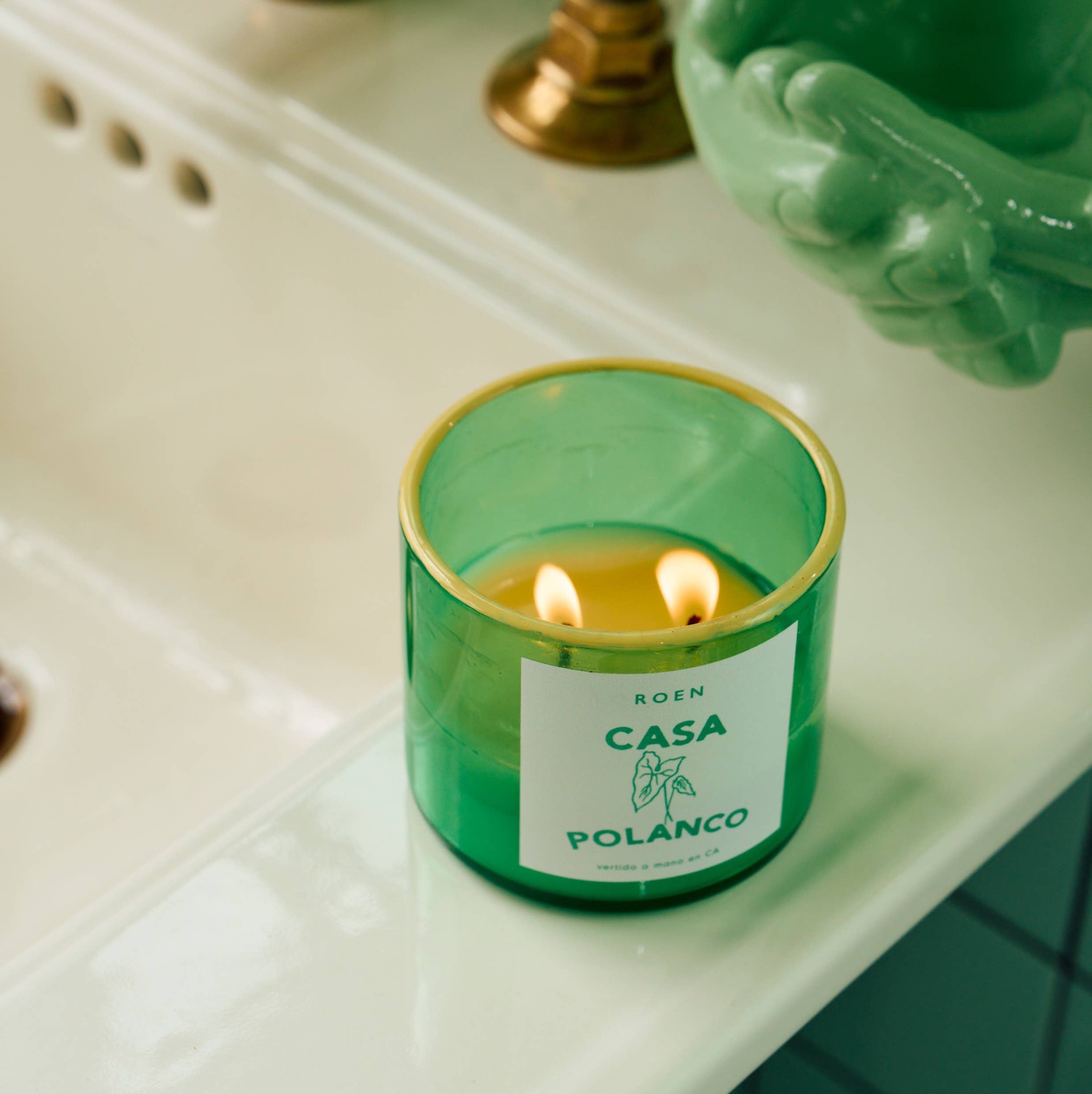 Inspired by Casa Polanco’s calm elegance with fresh linen, lush greenery, verbena, key lime, violet, and basil. Hand-painted jar designed to be re-loved and reused.