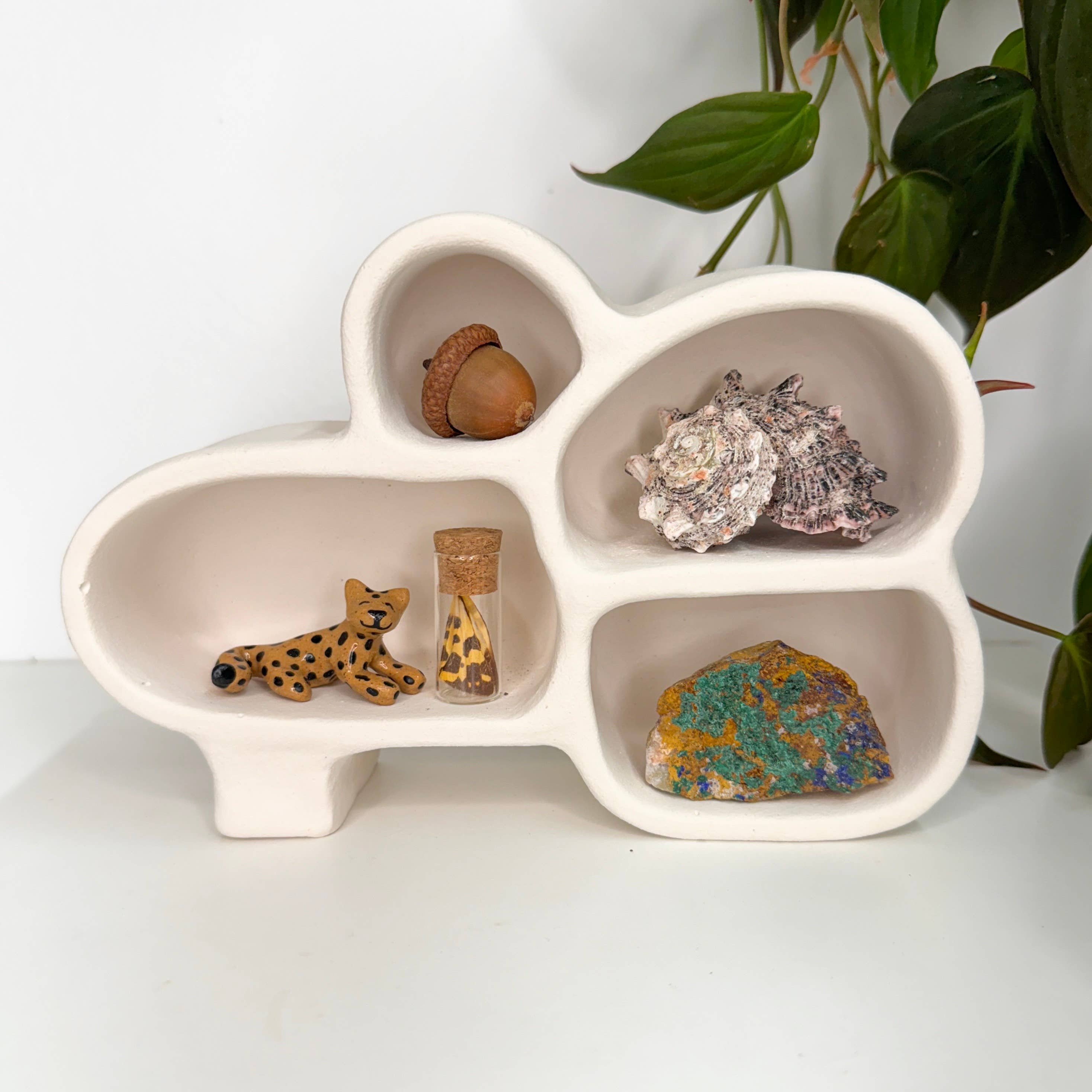 Handmade Cave of Inspiration shelf by The Minimalist Ceramist. Perfect for displaying crystals, rocks, air plants, and nature treasures.