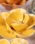 Bring everlasting blooms into your space with ceramic flowers—beautiful, handmade pieces that add a touch of nature-inspired charm without the upkeep. Each flower comes packaged in a lovely gift box and features a keyhole back, so you can display it on a wall or style it on a tabletop. Perfect for creating a blooming statement that never fades.