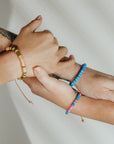 Our ceramic leather beaded bracelet is a grown-up take on the classic friendship bracelet — made for your inner 90s kid with a modern, unisexy edge. Each bracelet is hand-strung with richly glazed ceramic beads and finished with supple leather cord and a 14k gold-filled sliding clasp, creating an effortless mix of earthy texture, graphic punch, and elegant wearability.