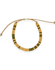 Our ceramic leather beaded bracelet is a grown-up take on the classic friendship bracelet — made for your inner 90s kid with a modern, unisexy edge. Each bracelet is hand-strung with richly glazed ceramic beads and finished with supple leather cord and a 14k gold-filled sliding clasp, creating an effortless mix of earthy texture, graphic punch, and elegant wearability.