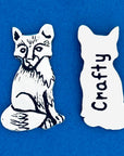 Meet your new favorite pocket companion! Keep it in your bag or use it to decorate your home. On one side, a beautifully detailed fox sits in quiet observation, while the other side cheekily reads 'Crafty.'
Fine hand-crafted pewter, made in Canada.