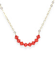 The Crystal Arc Necklace brings a playful twist to a minimal silhouette. Featuring a smooth, curved, colorful crystal arc, it’s designed to rest beautifully along your neckline. This piece adds an effortless pop of color that’s perfect for layering or wearing solo when you want a simple statement.