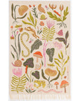 The Gardenland Embroidered Dishtowel features playful tassels and a vibrant design with ferns, flowers, snakes, snails, and frogs, bringing garden life to your kitchen.