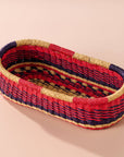 Add these bright, handcrafted baskets to your table, shelf or closet - the uses are limited only by your imagination! Gorgeously handwoven from locally sourced veta vera grass, the utilitarian design features an assortment of vibrant colors. Each one is woven while wet and can be re-shaped by adding water, perfect for the kitchen and bath! Durable and washable, these baskets are a beautiful and unique addition to any decor. 