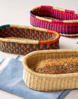Add these bright, handcrafted baskets to your table, shelf or closet - the uses are limited only by your imagination! Gorgeously handwoven from locally sourced veta vera grass, the utilitarian design features an assortment of vibrant colors. Each one is woven while wet and can be re-shaped by adding water, perfect for the kitchen and bath! Durable and washable, these baskets are a beautiful and unique addition to any decor. 