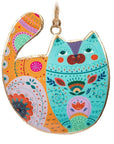 Anyone who loves cats and colour will absolutely adore these eye-catching Groovy Cat Ornaments. Available in four assorted styles, these double-sided metal ornaments are each imprinted with a uniquely illustrated cat accented with vibrant colors and decorative patterns for a delightful decorative addition to any space.
