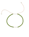 Pick your perfect color.
The Irena Anklet is made to order in your choice of color from a wide selection of solid hues. It’s an easy way to create something just for you.
Each anklet is handcrafted with beautiful Japanese glass beads on an adjustable cord that comfortably fits most ankles. You can choose from three metal finishes: 14k gold-filled with silk cord, sterling silver with silk cord, or brass with nylon cord. The Irena is simple, stackable, and uniquely yours.