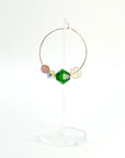 Elegant with a hint of drama, the Large Muse Hoops are a wearable palette of champagne, amethyst, and emerald crystals. Their rich, layered tones and refined silhouette make them a perfect pairing for elevated moments—or everyday beauty with a little mystique.
