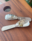 Serve up some serious style and charm with a petite oyster-shaped paté knife, perfect for any party or as a gracious gesture of hospitality. The handle is crafted from pewter and boasts a durable stainless steel blade. Fine hand-crafted pewter and stainless steel, made in Canada.
