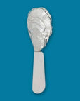 Serve up some serious style and charm with a petite oyster-shaped paté knife, perfect for any party or as a gracious gesture of hospitality. The handle is crafted from pewter and boasts a durable stainless steel blade. Fine hand-crafted pewter and stainless steel, made in Canada.