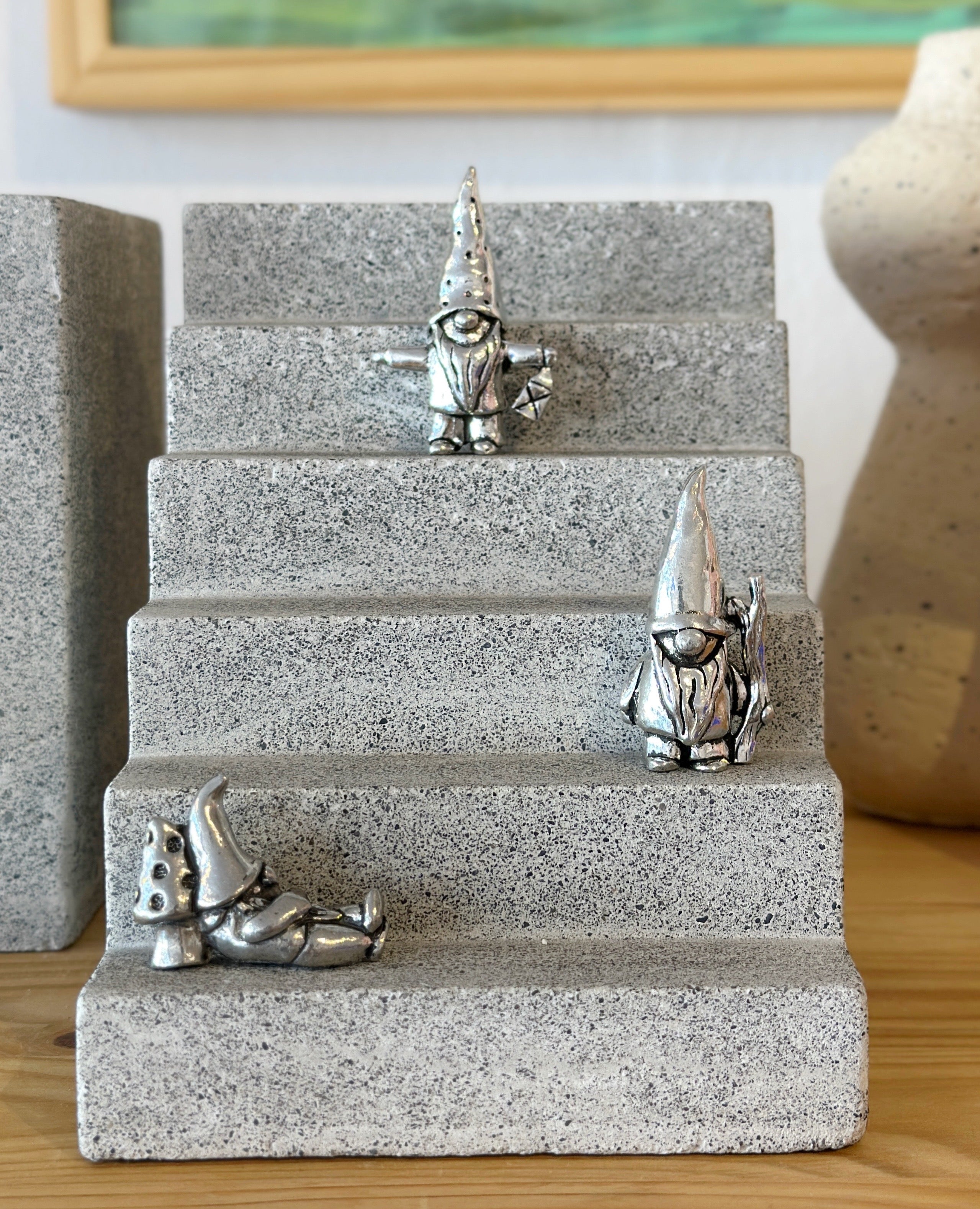 Whimsical 2 in pewter gnome, handcrafted in Canada! With 3 styles—lantern, stick, or mushroom nap—he’s perfect for adding character to your garden or shelf.