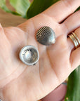 A meaningful keepsake, this pewter shell reveals "love" on the back. Great for collections, gifts, or sharing positivity. Handmade in Canada.
