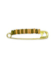 Inspired by the iconic pins from childhood brownie and scout days, our beaded safety pin shoe pin blends solid brass durability with colorful Greek ceramic beads for a fresh take on a classic. Each pin is crafted to add a playful, nostalgic touch to your favorite shoes, bags, or gear — a small symbol of friendship and adventure.