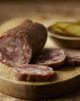 Treat yourself to the bold and flavorful taste of our Uncured Bacon & Bourbon Salami Sausage from Salt & Twine. Small batch charcuterie that some call adult lunchables.