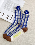 Step up your sock game with these fun, transparent sheer socks. Each pair features playful designs that add a subtle pop of personality to any outfit. Lightweight and breezy, they’re perfect for layering with sneakers, heels, or flats for a whimsical, stylish touch.