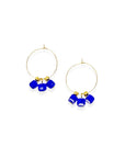 Cool, collected, and effortlessly modern. The Small Anchor Hoops feature a trio of bold cobalt crystal cubes clustered together for a structured, sculptural silhouette. Subtle but striking, they’re your go-to hoops when you want a pop of color with clean, confident lines.
