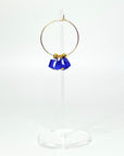 Cool, collected, and effortlessly modern. The Small Anchor Hoops feature a trio of bold cobalt crystal cubes clustered together for a structured, sculptural silhouette. Subtle but striking, they’re your go-to hoops when you want a pop of color with clean, confident lines.