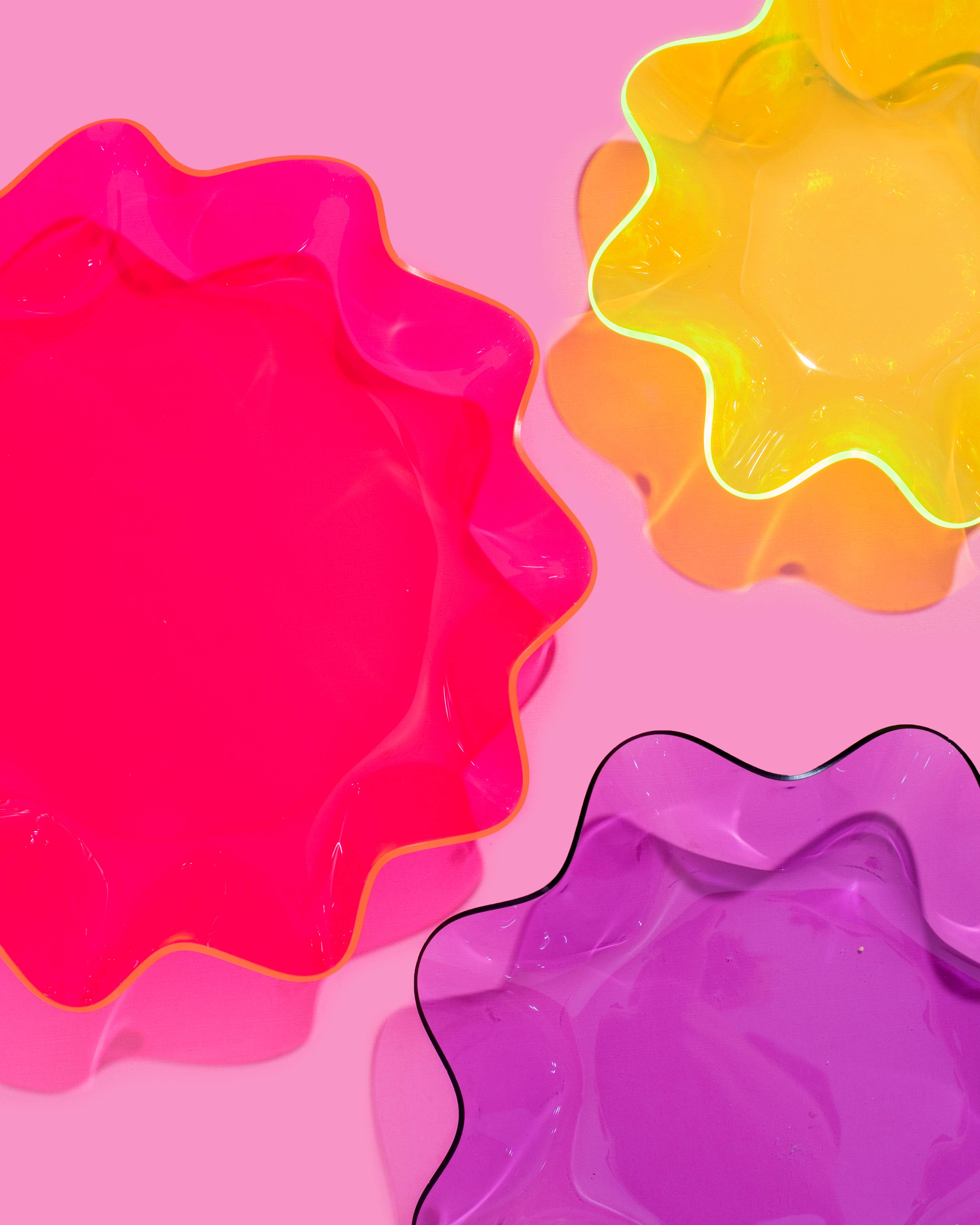 Add a splash of bold color to your space with this neon green wavy acrylic bowl! Its playful shape and vibrant hue make it perfect for catching keys or styling on a shelf. Made from durable acrylic, it’s both functional and eye-catching—great on its own or nested with other bowls for a layered look.