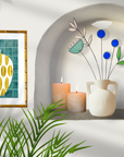 Bring a pop of color and artistry to your home with this handcrafted set of stained glass blue globe thistles by Samara Designs Studio. Each stem is carefully handmade using cobalt blue stained glass, cut and assembled with care to create a lasting botanical accent that will never wilt or fade.