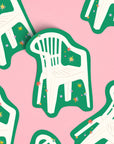Featuring the iconic chair from Bad Bunny’s album Debí Tirar Más Fotos, this sticker evokes nostalgia, reflection, and shared moments—the perfect nod to the artist’s celebration of memory, identity, and cultural roots.